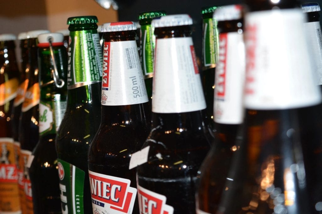 A close up of several beers in bottles